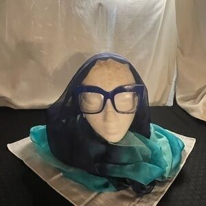 Bright royal blue embellished plastic frame with clear plastic lenses.